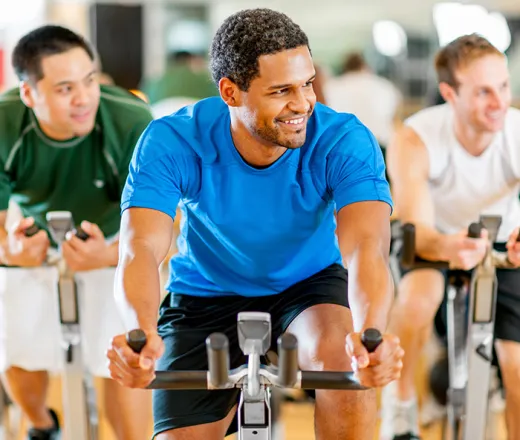 adult man on spin bike
